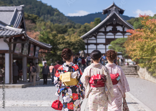 Japanese women in kimono is walking to Tenryu-ji temple, Kyoto, Arashiyama, Japan.