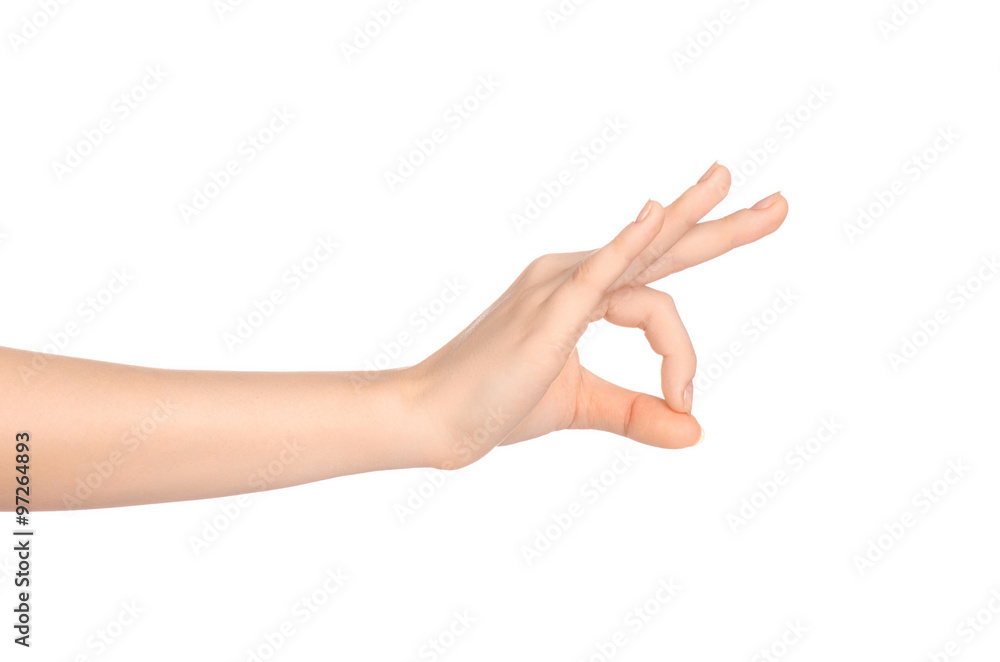 Beauty and Health theme: beautiful elegant female hand show gesture on an isolated white background in studio Beauty and Health theme: beautiful elegant female hand show gesture on an isolated white background in studio