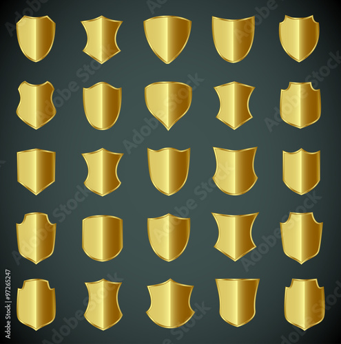 Golden shield design set with various shapes.