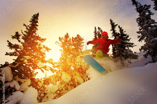 Photography Snowboarder doing a toe side carve