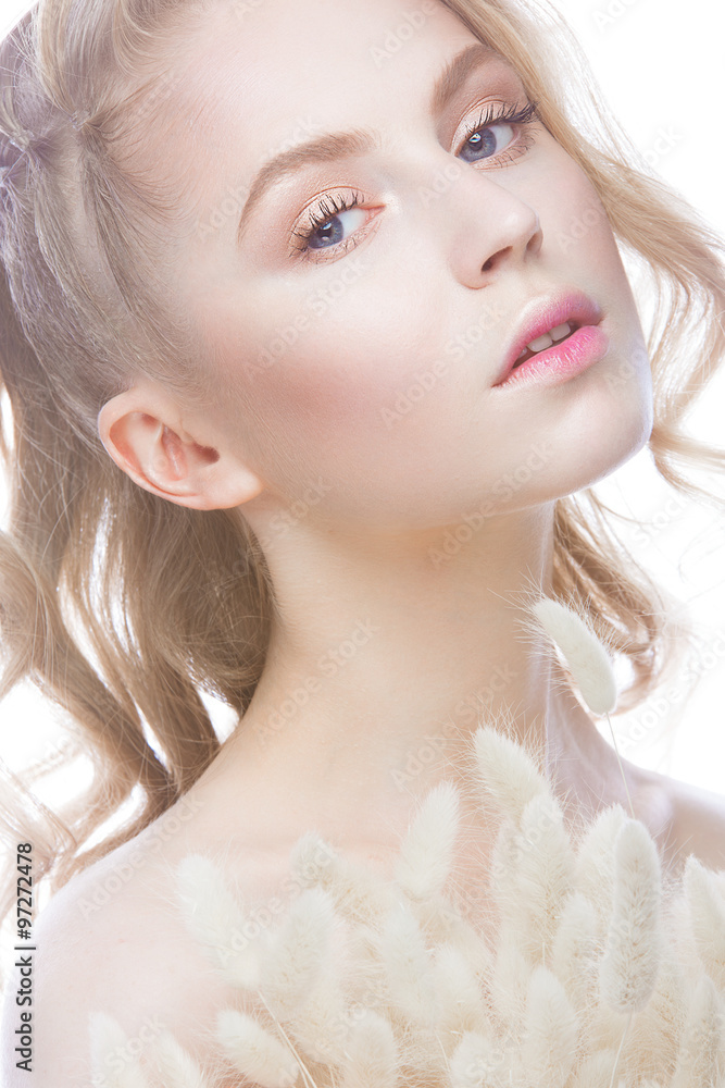 Beautiful girl with a gentle make-up and hairstyle, ears of corn in her hands. Beauty face. Beautiful girl with a gentle make-up and hairstyle, ears of corn in her hands. Beauty face.