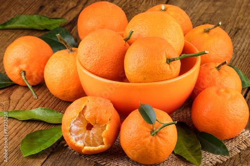 Mandarins Tangerines on Rustic Background