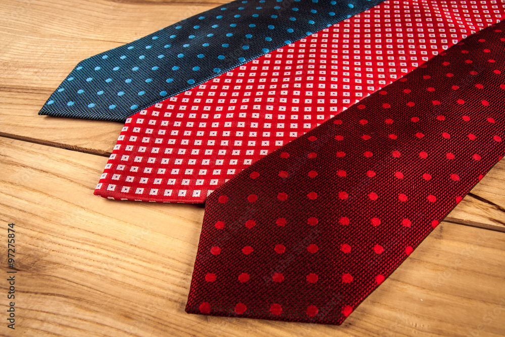 Fathers day composition of three ties hang on wooden wall backround Fathers day composition of three ties hang on wooden wall backround