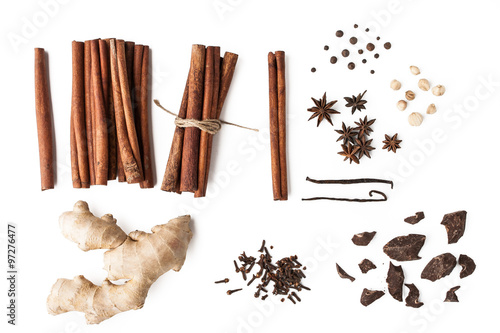Spices mix with chocolate on the white background photo