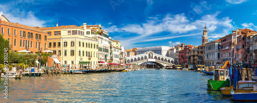 Gondola at the Rialto bridge in Venice photo