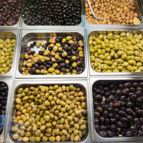 stall of olives at the market. Green and black olives