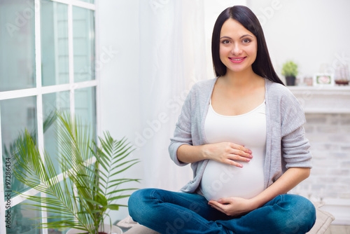 Free Download Young pregnant woman at home - GFXLoad