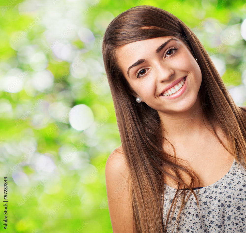 Fototapeta premium portrait of pretty young woman smiling closeup