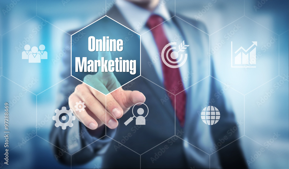 Obraz premium Man in Office touching display Online Marketing