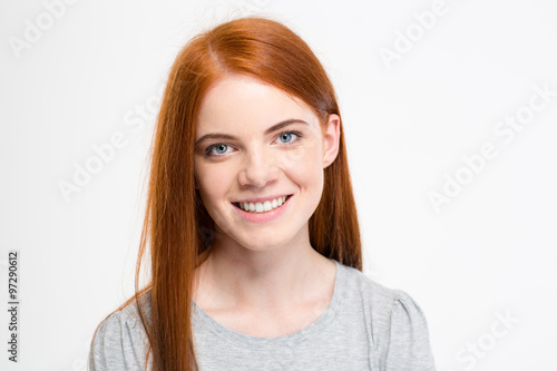Portrait of positive cheerful young female with long red hair © Drobot Dean
