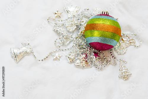 Rainbow Christmas ball with christmas chain on a white backgroun