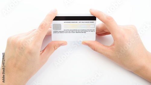 Close up of hand holding credit card