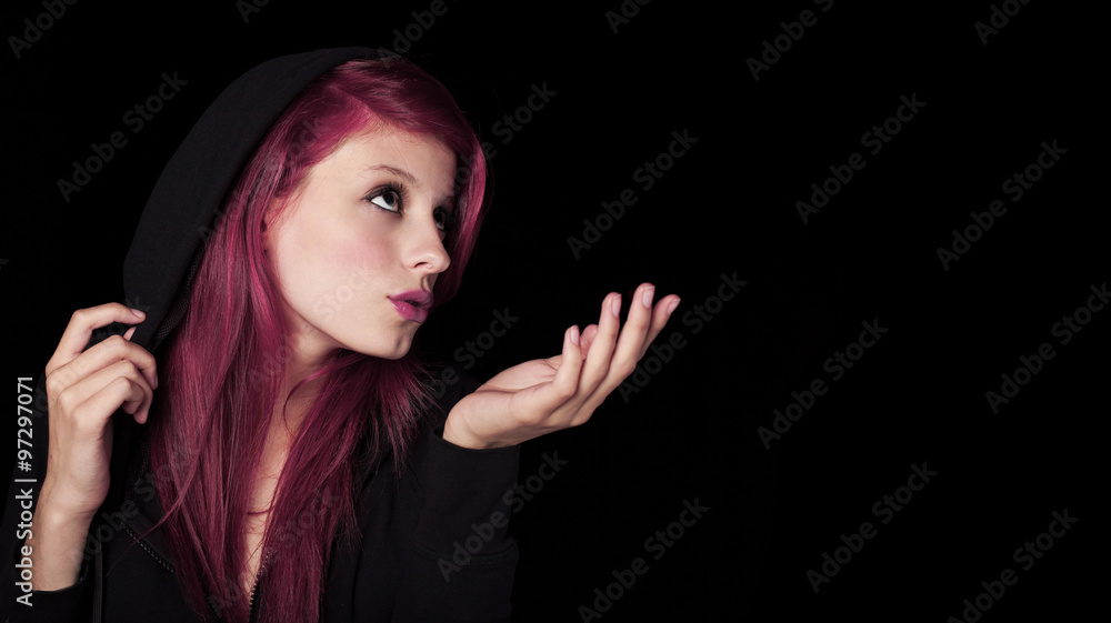 misterious young woman sending a kiss at night misterious young woman sending a kiss at night