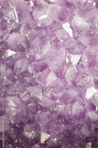 Natural amethyst crystal background. Amethyst is a violet variety of quartz