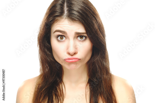 Fuuny woman disapponted sad eomtion face portrait. Isolated on white background