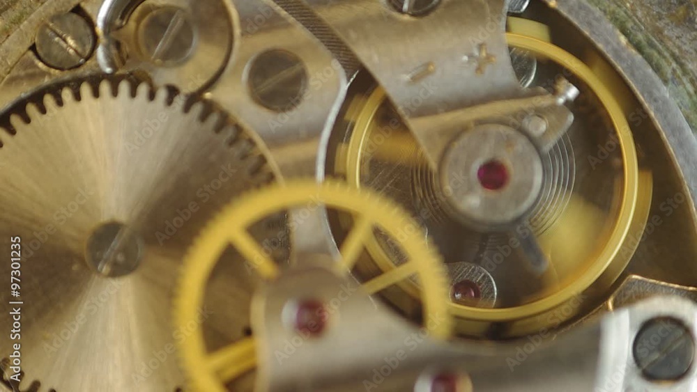 Metal cogwheels inside clockwork. Concept Eternity, Teamwork , Idea Technology. Macro. Tick-Tick Sound Metal cogwheels inside clockwork. Concept Eternity, Teamwork , Idea Technology. Macro. Tick-Tick Sound