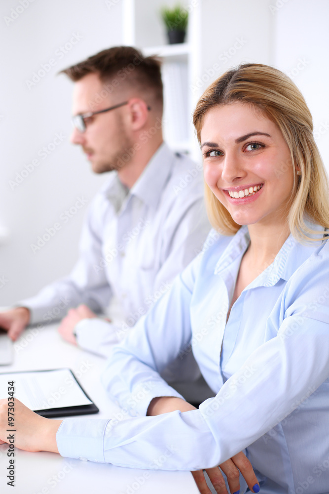 Two successful business partners working at meeting in office Two successful business partners working at meeting in office