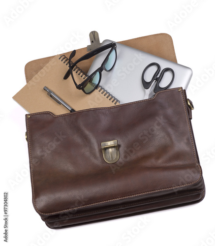 Business briefcase businessman. Brown. Laptop, notebook, glasses, scissors, pen.