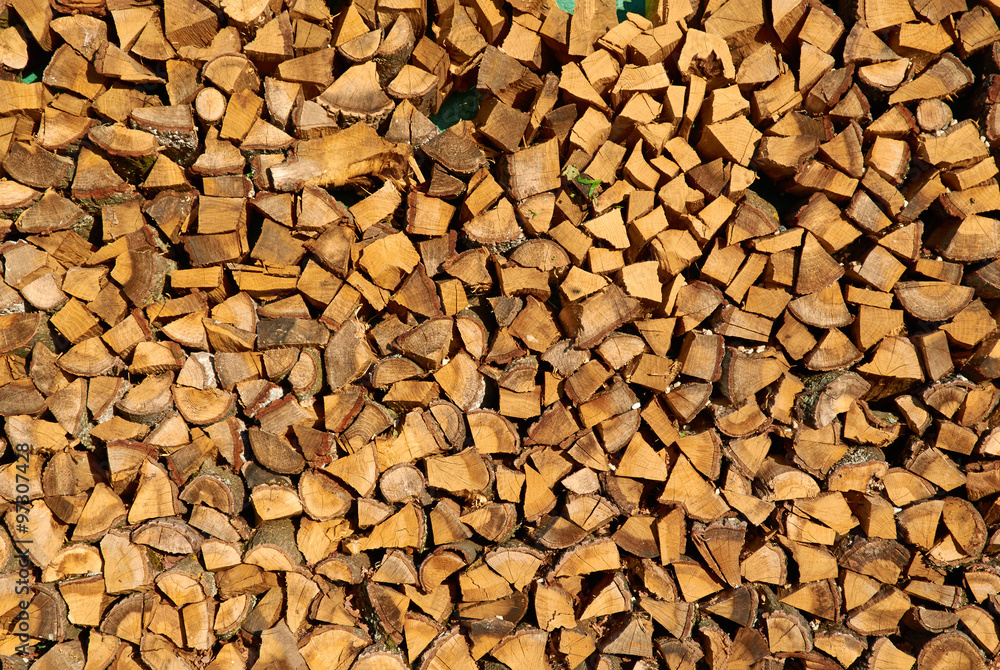 Stack of chopped firewood prepared for winter Stack of chopped firewood prepared for winter