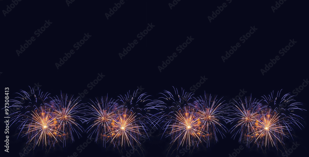 Fireworks background. Colorful fireworks in the night sky.