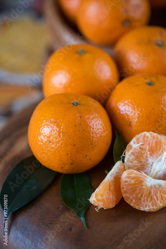 tangerines on wooden backgr...