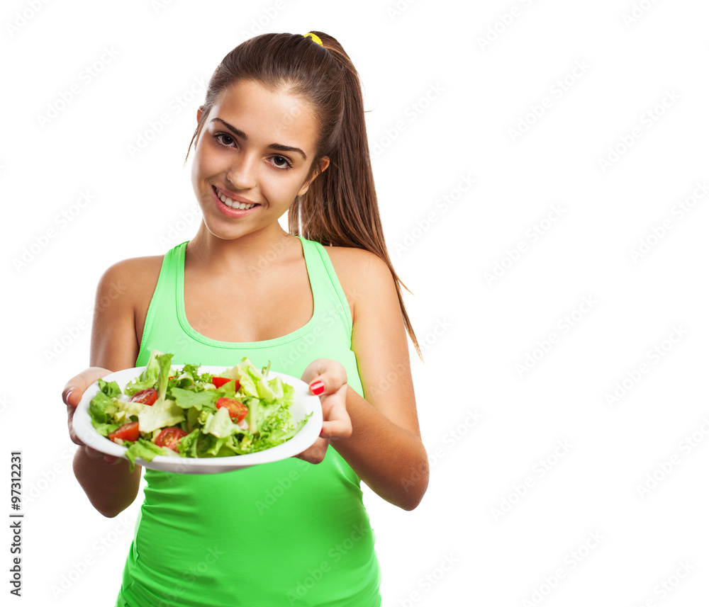 portrait of pretty young sporty woman holding a salad portrait of pretty young sporty woman holding a salad
