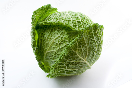 head of fresh cabbage on a white background.ïîèñê