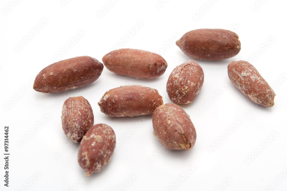 ..salted peeled peanuts on a white background ..salted peeled peanuts on a white background