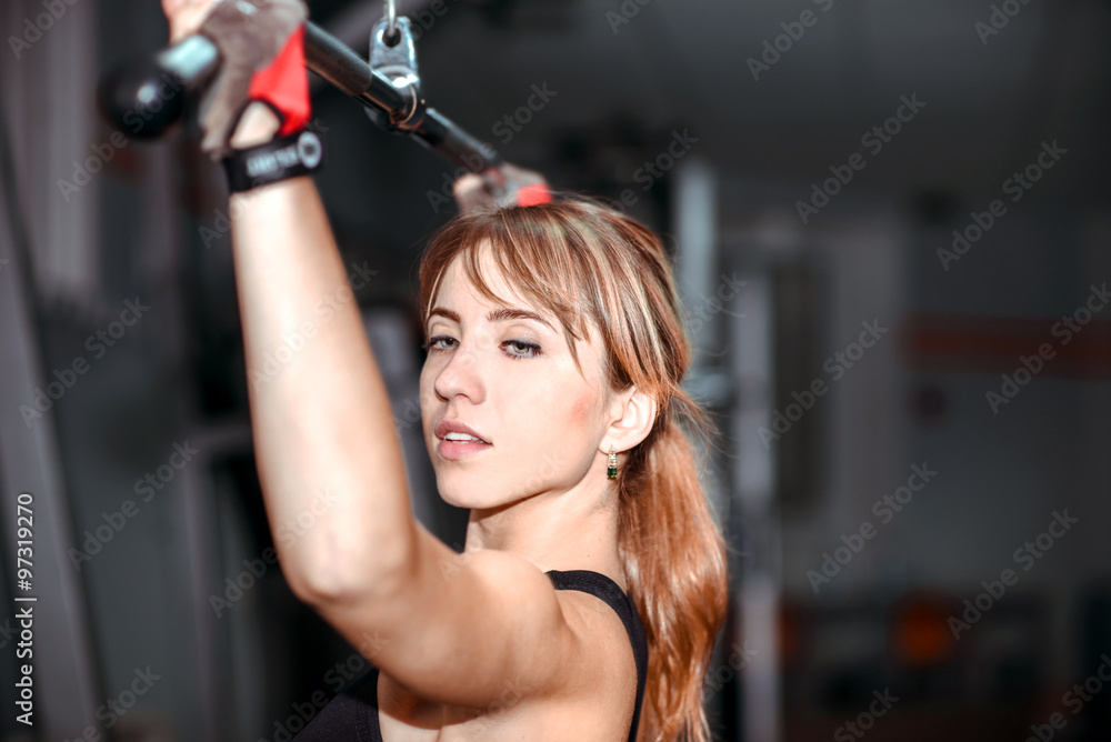 Young pretty girl work out in the gym Young pretty girl work out in the gym