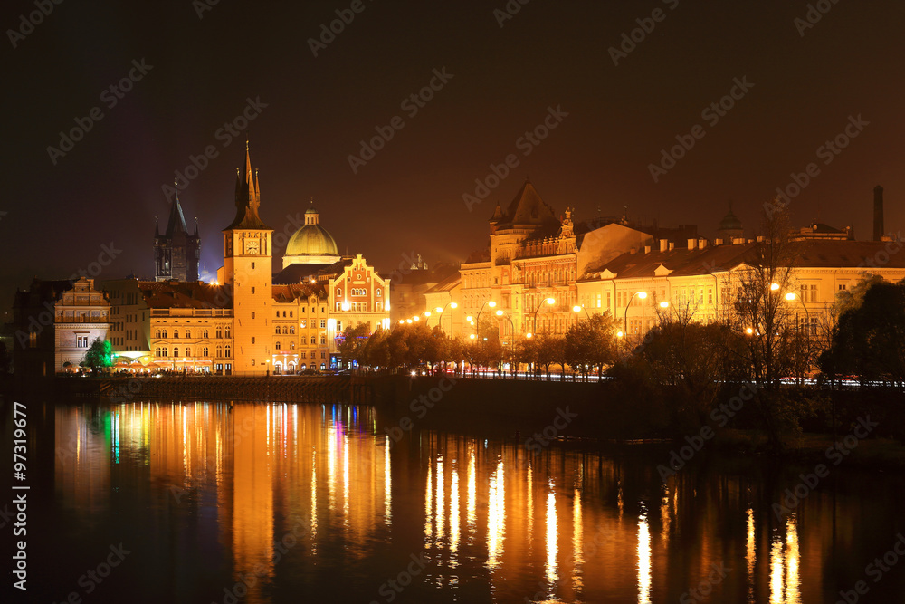 The night View on bright Prague Old Town above the River Vltava, Czech Republic