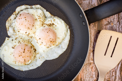 Over-easy eggs with fresh slasa and coffee