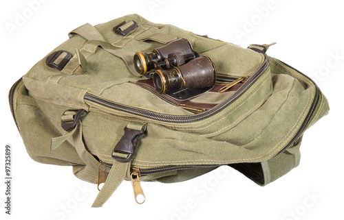 The backpack of color lying horizontally khaki and the vintage f