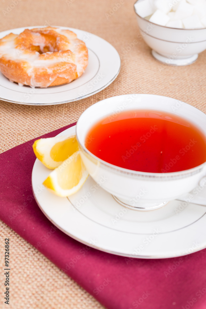 Breakfast with pastries, and hot tea with lemon. Breakfast with pastries, and hot tea with lemon.