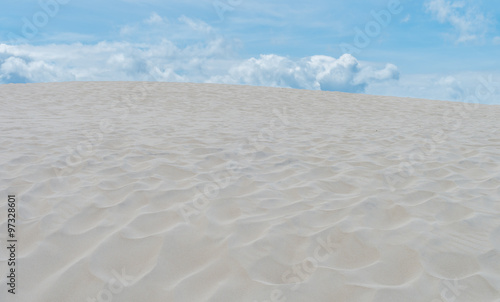 Sand dune and blue cloudy sku on the Baltic coast in Poland