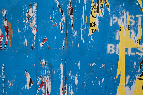 Blue paint and peeling paper