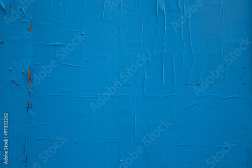 Blue paint and peeling paper