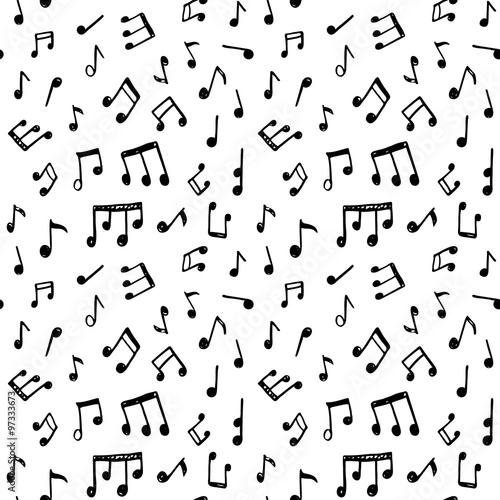 Doodle seamless pattern with hand drawn music notes.
