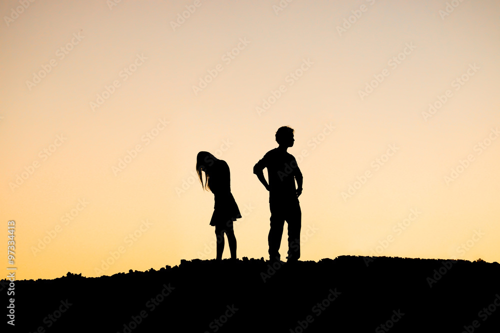 Silhouette of a angry woman and man on each other / Relationship difficulties / Couple break up