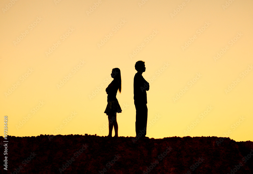 Silhouette of a angry woman and man on each other / Relationship difficulties / Couple break up