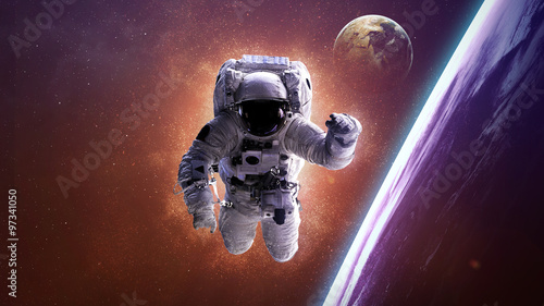 Astronaut in outer space. Elements of this image furnished by NASA #97341050