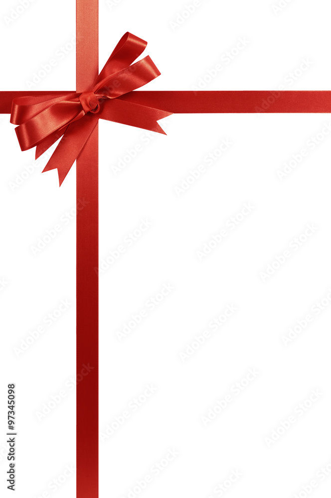 Red bow gift ribbon vertical upper top corner border frame isolated on white background for christmas or birthday present decoration or design photo Red bow gift ribbon vertical upper top corner border frame isolated on white background for christmas or birthday present decoration or design photo