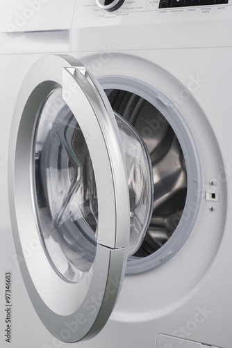 Isolated washing machine on a white background © shkliarov