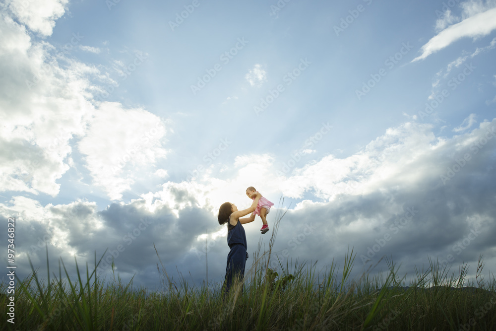 Happy young family spending time outdoor on a summer day - Vibra Happy young family spending time outdoor on a summer day - Vibra