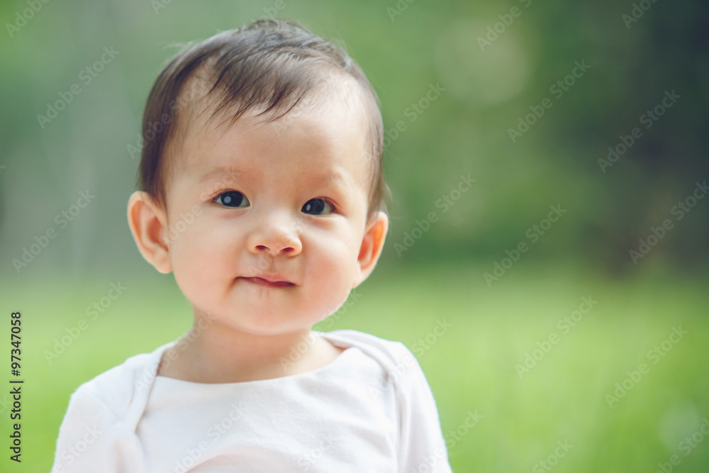 Baby happy in garden, new family and love concept (soft focus on Baby happy in garden, new family and love concept (soft focus on