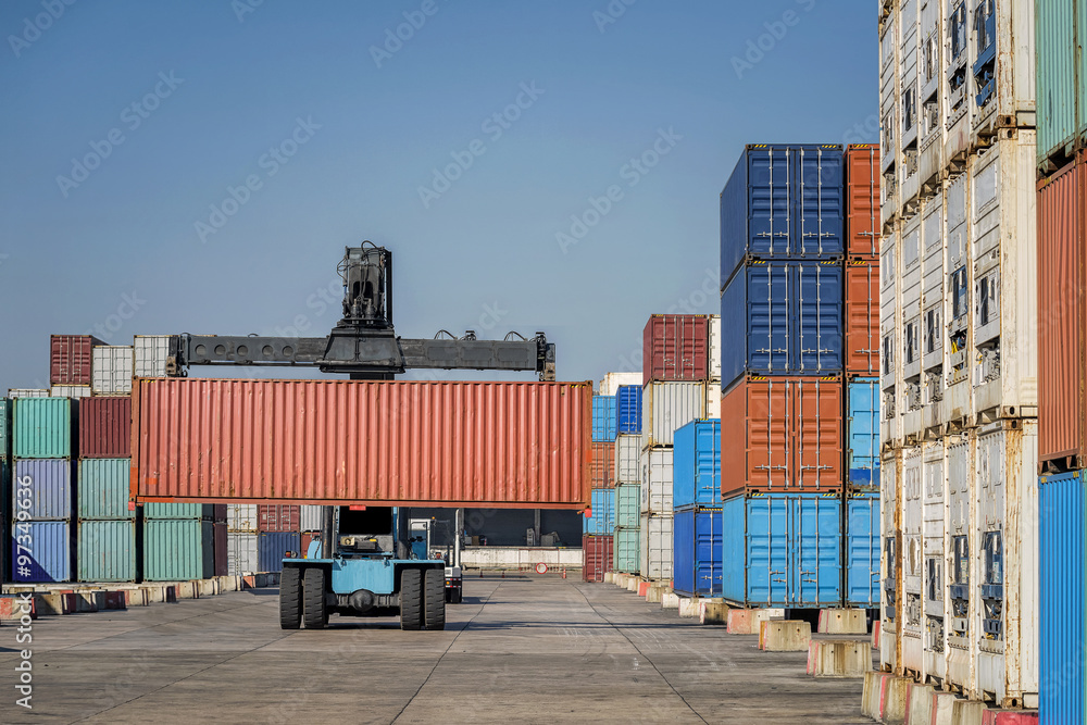 Fototapeta premium forklift handling the container box in logistic zone
