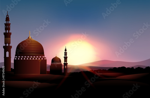 Mosque on the field at sunset