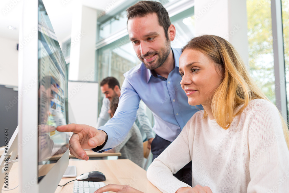 Fototapeta premium Young attractive people taking a training course with formator