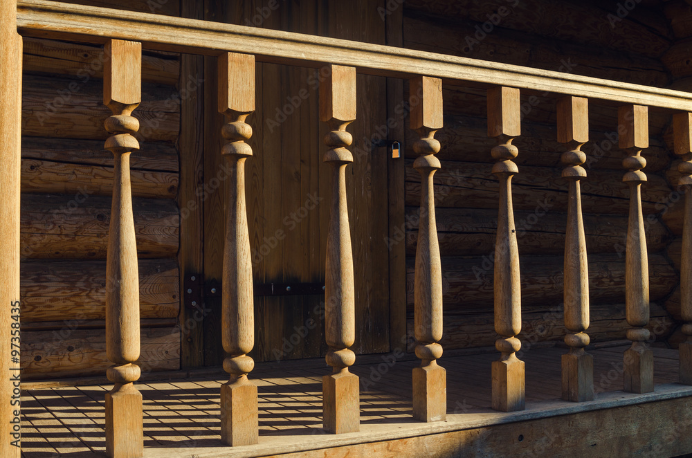 Fototapeta premium Wooden banister of house exterior