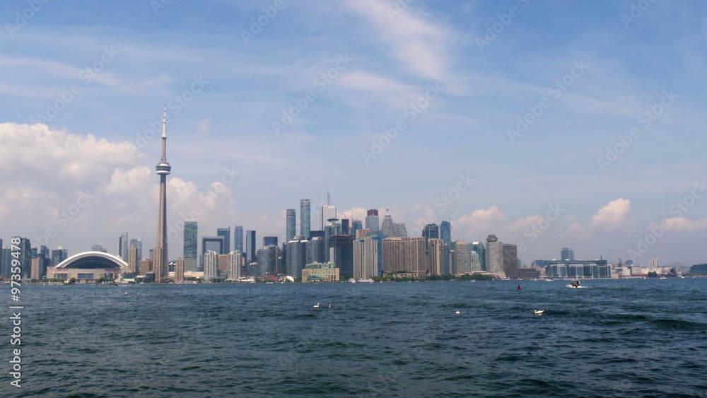 airplane flying in front of toronto skyline 4K UHD airplane flying in front of toronto skyline 4K UHD