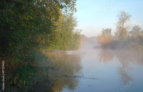 Morning landscape with fog on the river